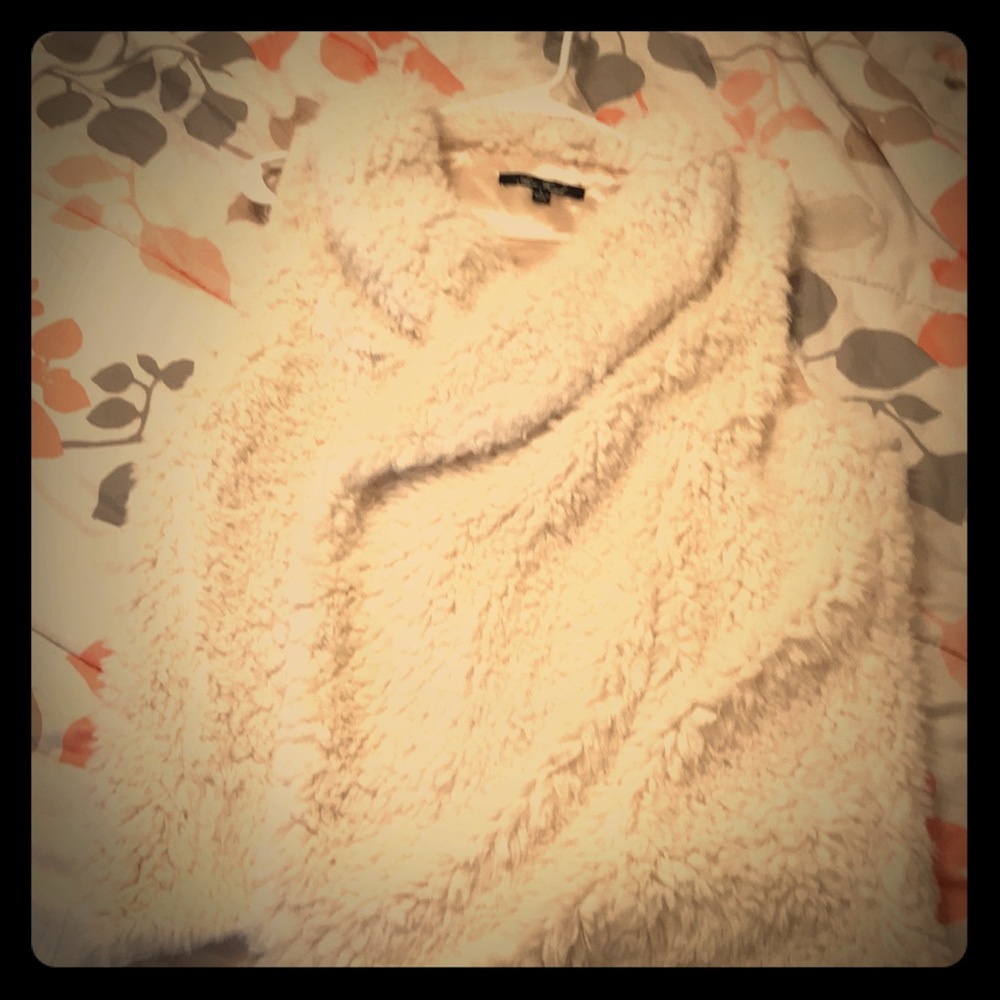 Cream colored vest